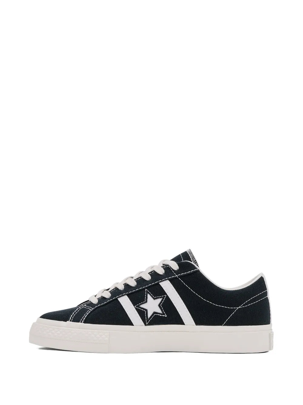 Black low-top sneakers with star emblem panel, lace-up, white midsole