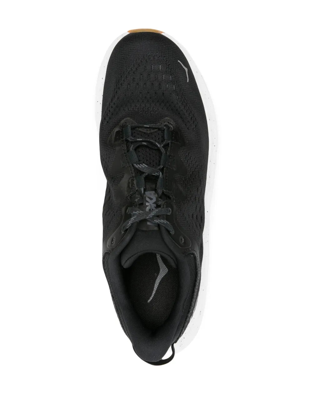 Black lace-up sneaker front view with textured upper and white midsole