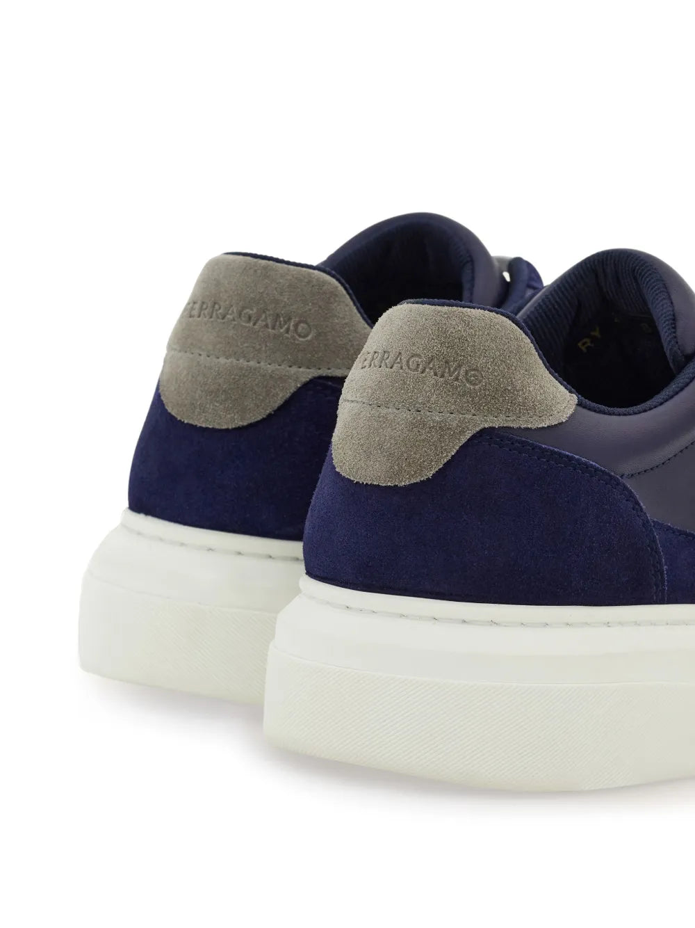 Ferragamo Gancini leather sneakers with midnight blue suede uppers and cushioned back