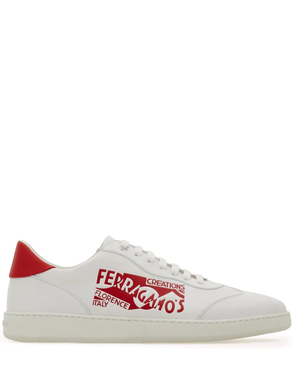 White leather low-top sneakers with red heel tab and Ferragamo logo on side