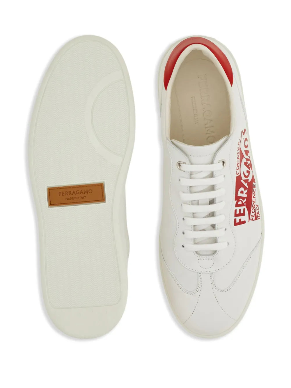 White leather sneaker sole and side with red-trim collar and Ferragamo logo