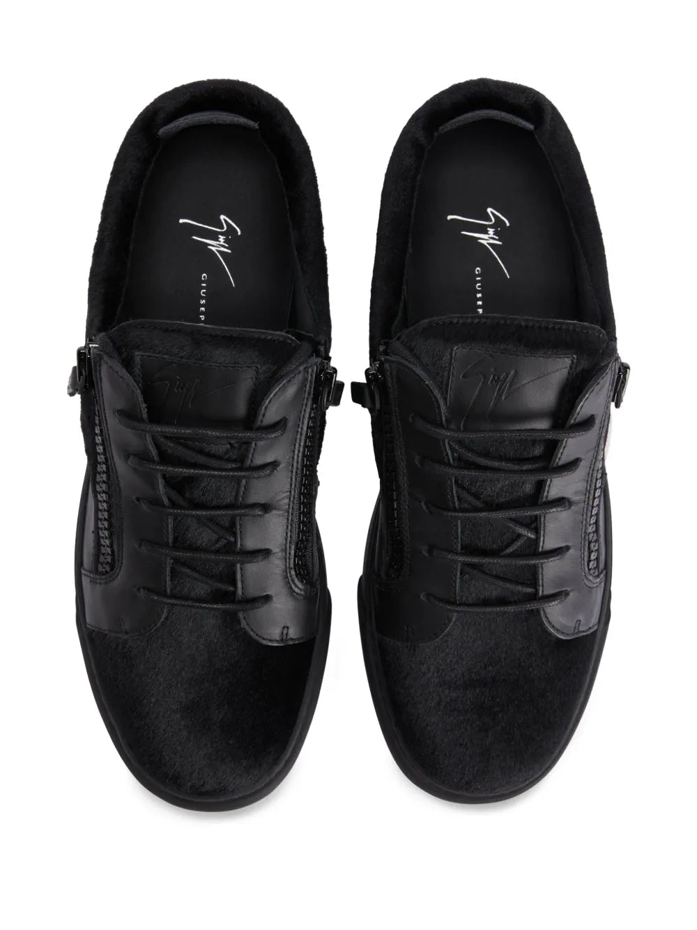 Black low-top sneakers top view with lace-up and side double zippers, padded collar