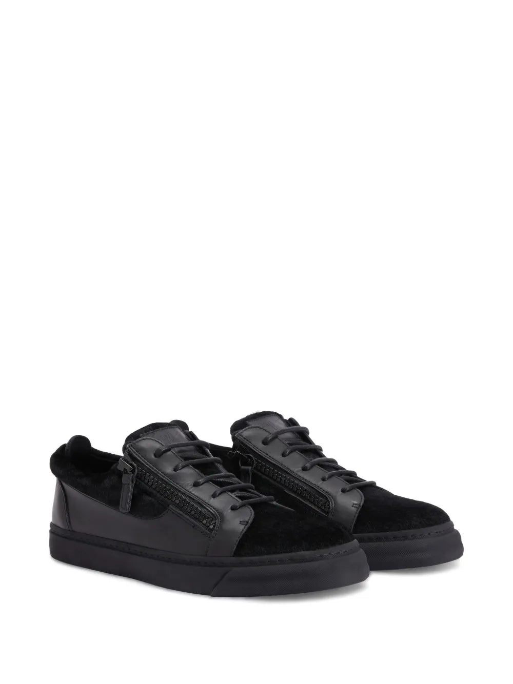Black low-top sneakers pair with lace-up, side double zippers, textured upper