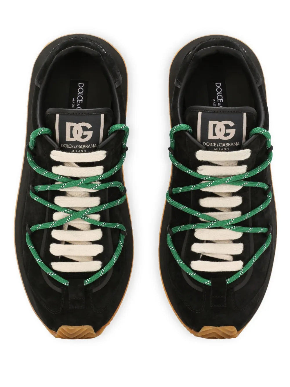 Black runner sneakers with green laces, DG tongue patch, and white laces.