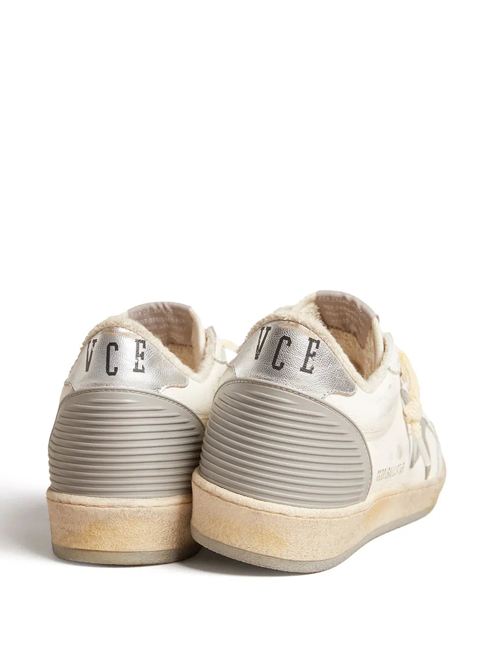 White leather sneakers heel view with 'ICE' heel logo and ribbed rubber sole