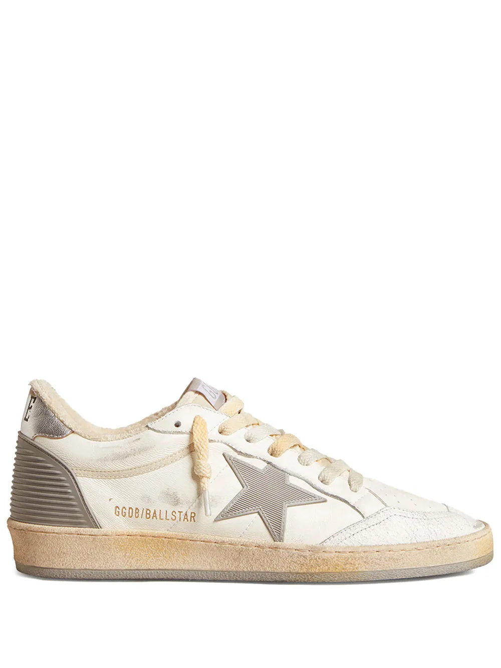 White leather low-top sneakers with gray star side and lace-up front