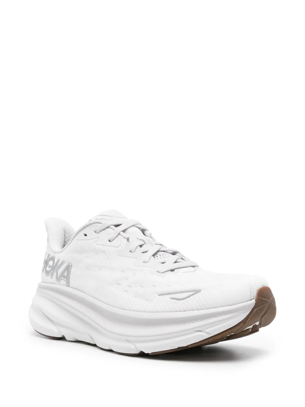 White Hoka lace-up sneakers with side logo and rounded rocker-style sole