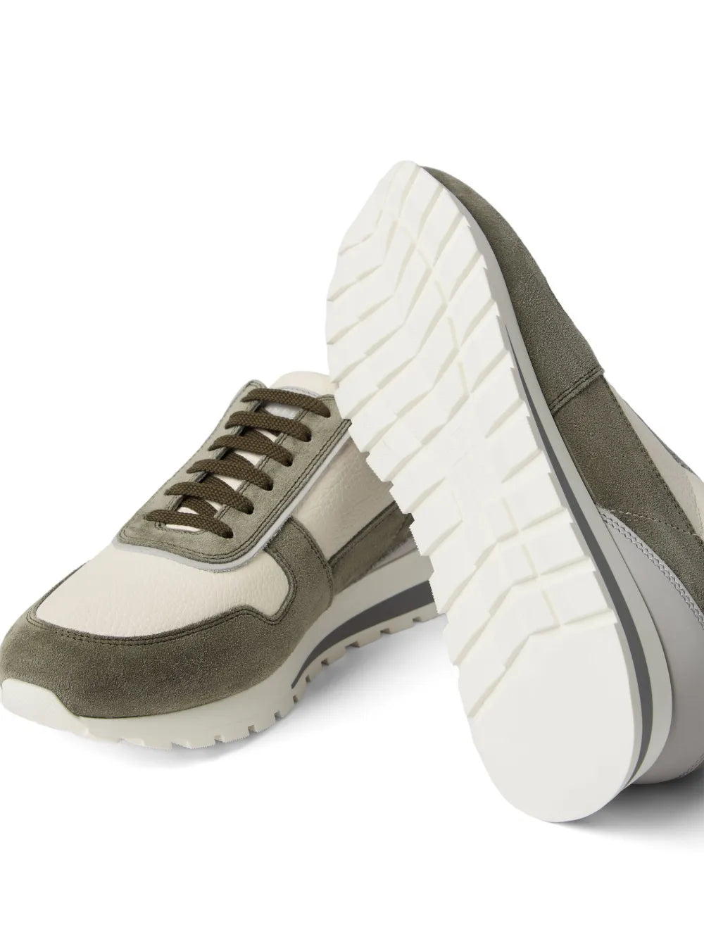 Color-block sneaker in white and olive green with lace-up front and tread sole