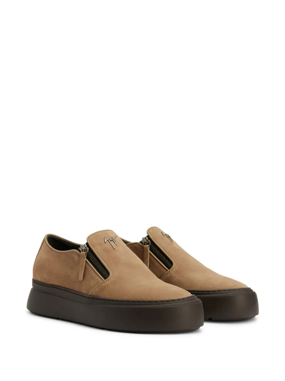 Pair of camel suede low-top sneakers with side zips and black rubber soles