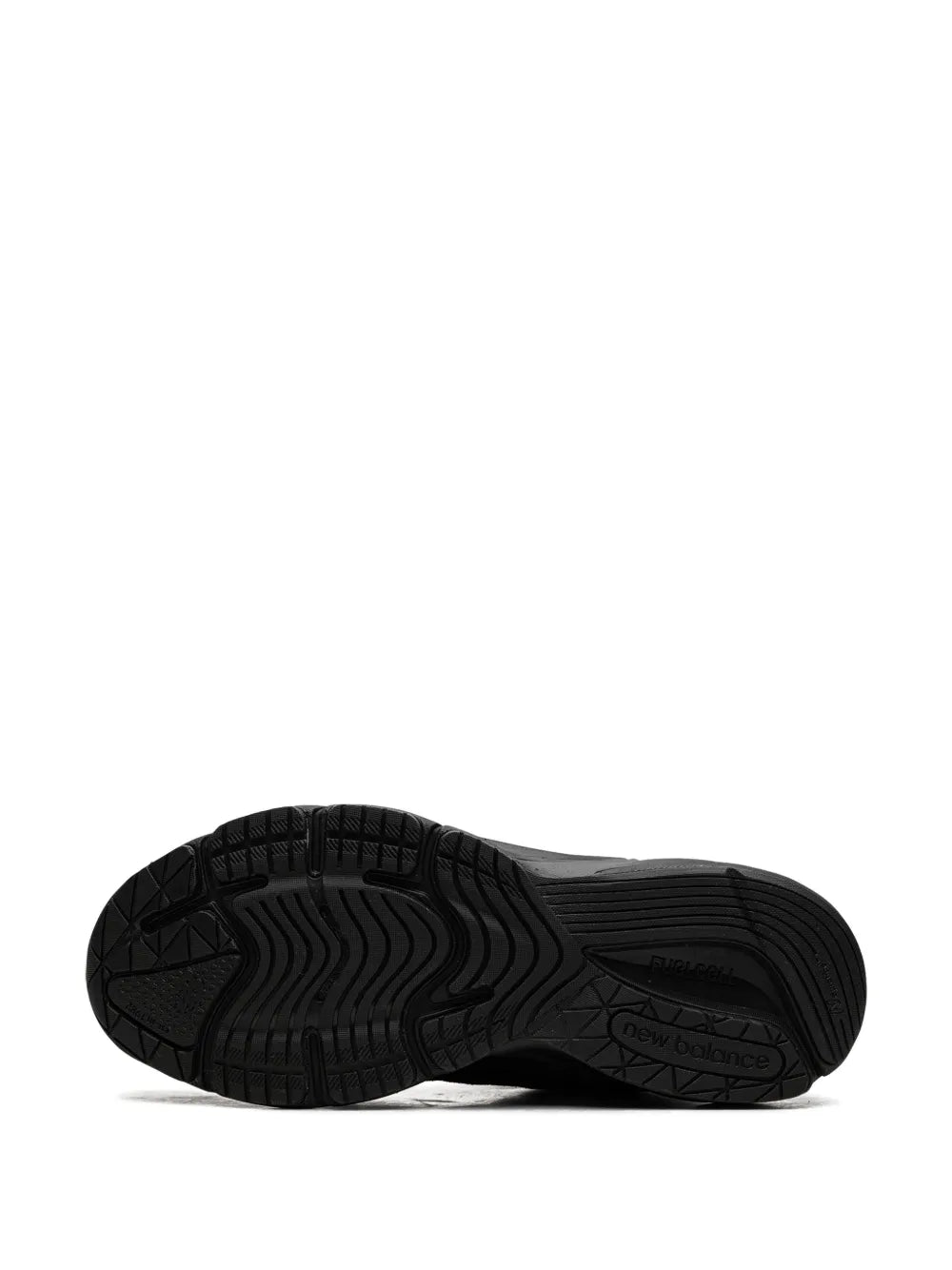 Black New Balance 990V6 rubber outsole tread, bottom view.
