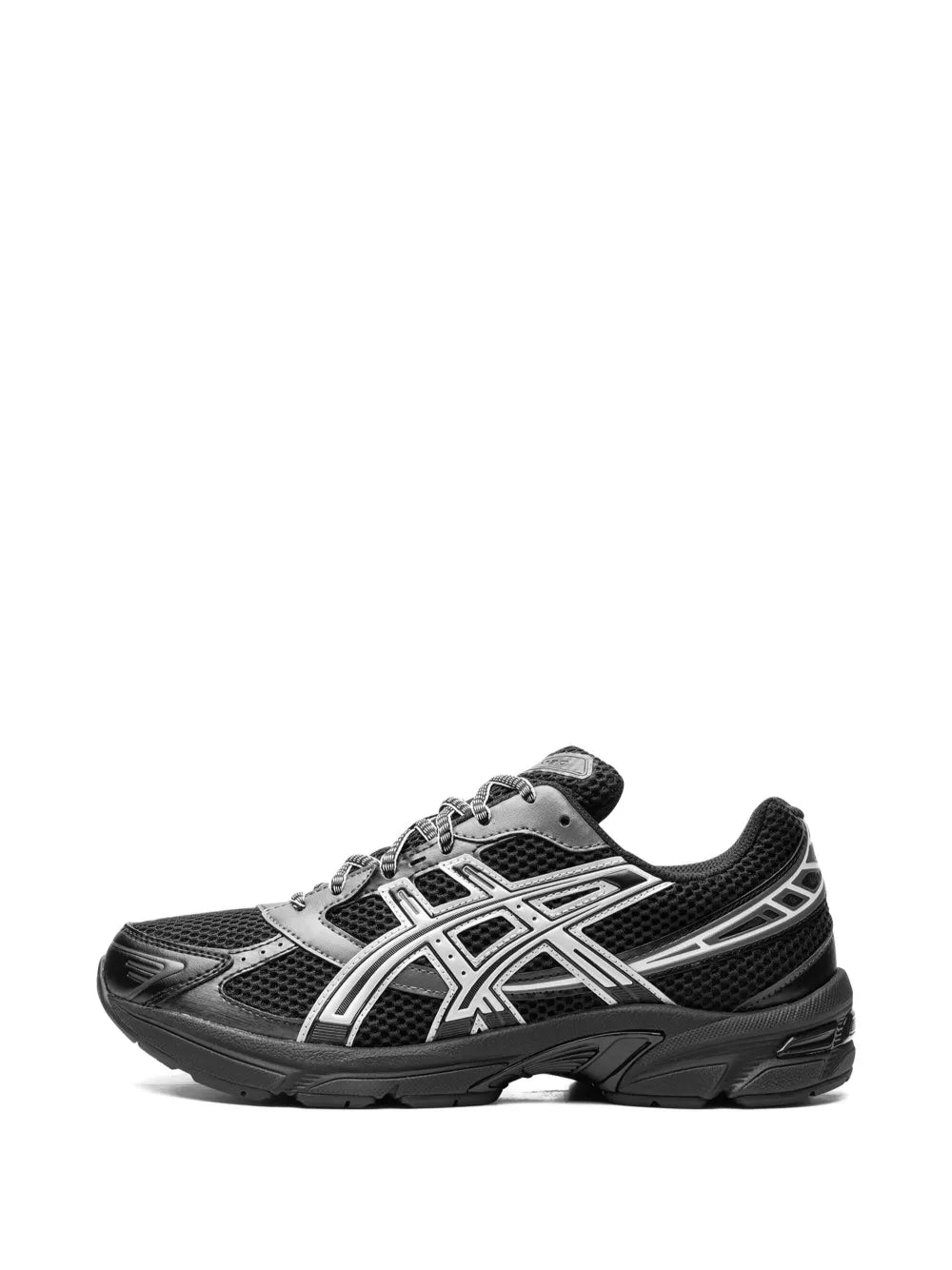 Black and white Asics Gel-1130 sneakers with textured toe cap and lace-up