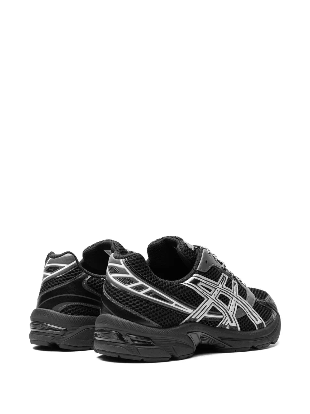 Black and white Asics Gel-1130 sneakers heel and side profile