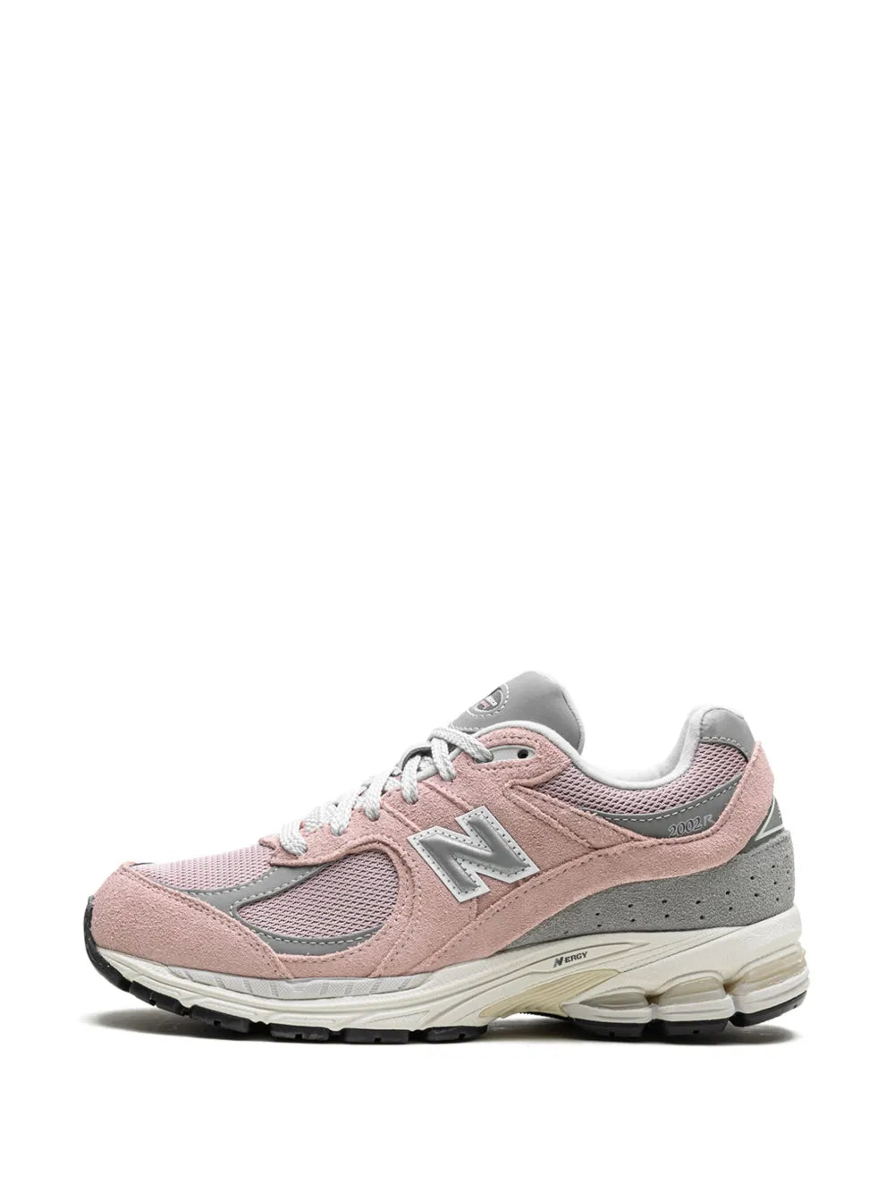 Light pink New Balance 2002R sneakers, front side view with grey tongue and N logo