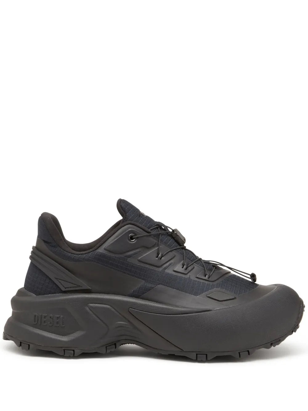 Low-cut runner sneakers in dark charcoal with lace-up front and chunky tread sole