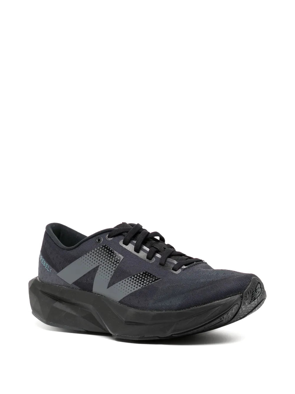 New Balance lace-up sneakers, dark upper with gray N logo and chunky midsole