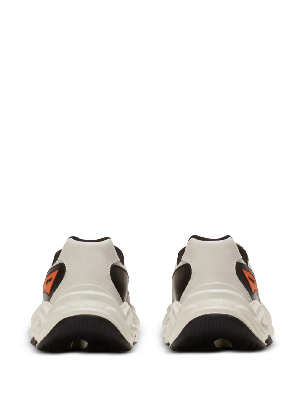 Back view of white and black lace-up trainers with orange side logo and padded heel