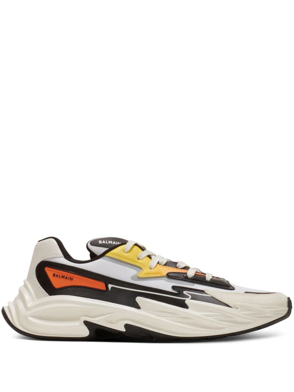 White and black low-top trainers with embossed logo, orange accent stripe, and lace-up