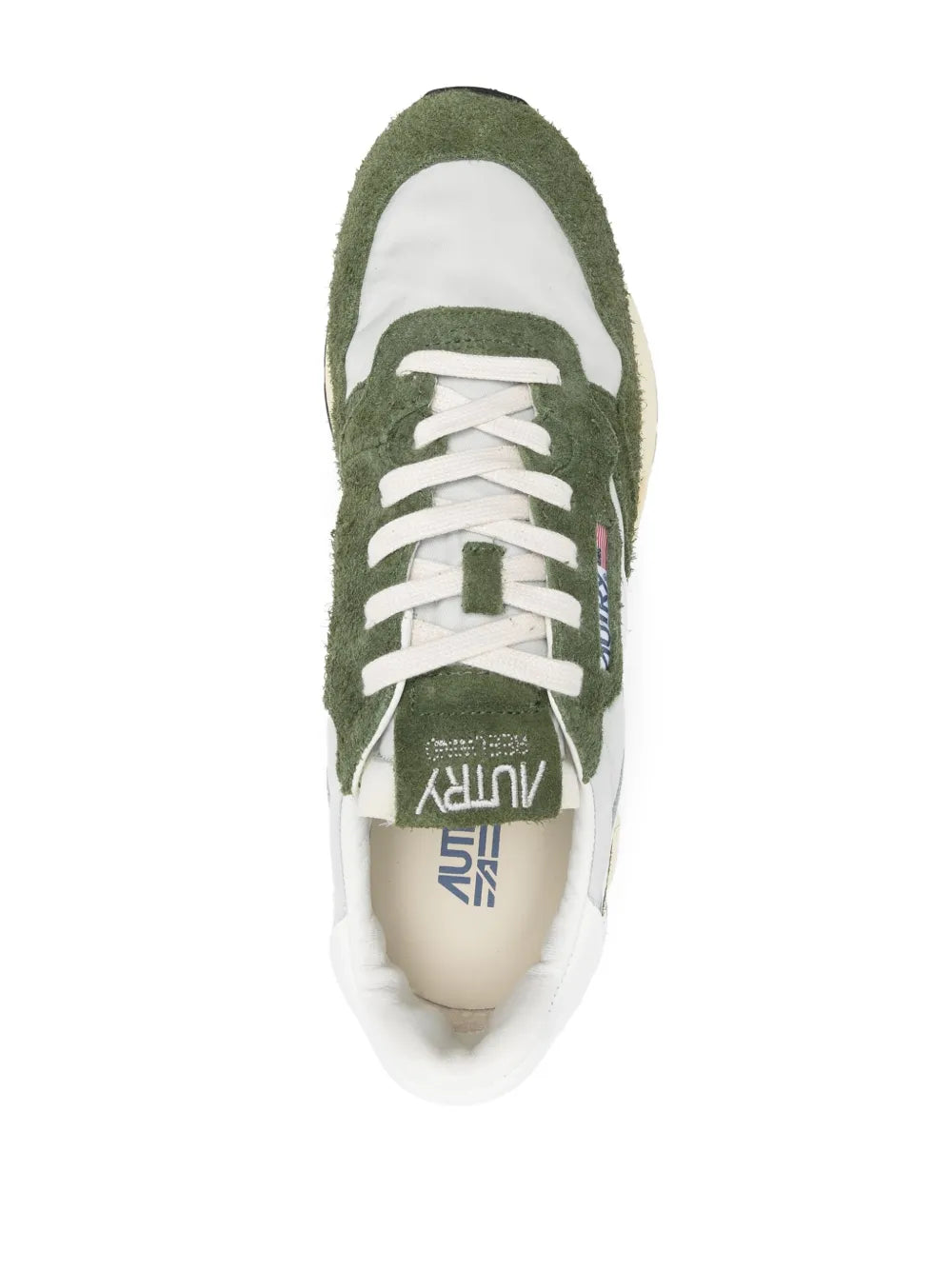 Autry low-top sneaker close-up, moss green lining with white laces and tongue label