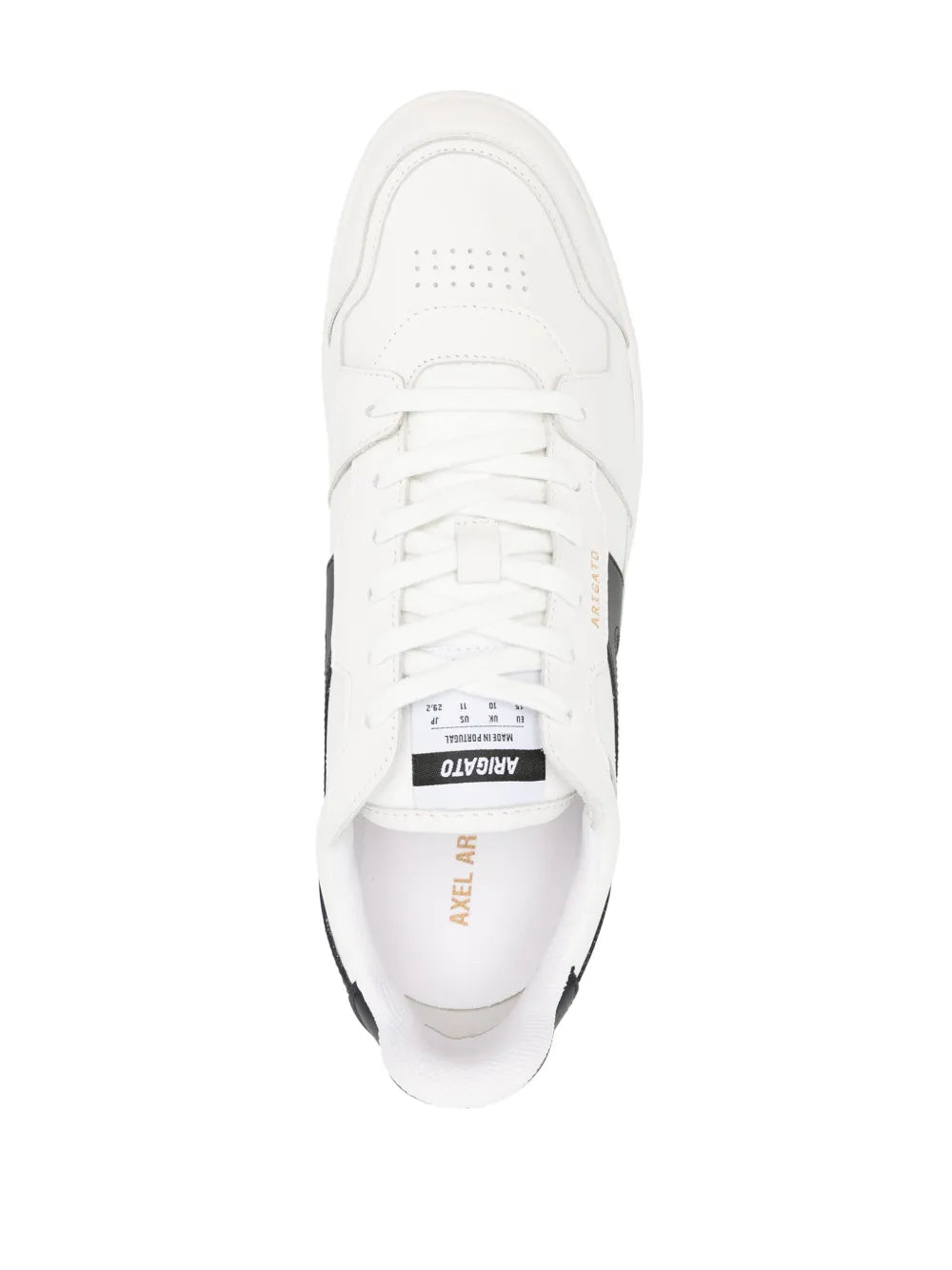 White low-top sneakers, top view, lace-up with tongue brand tag