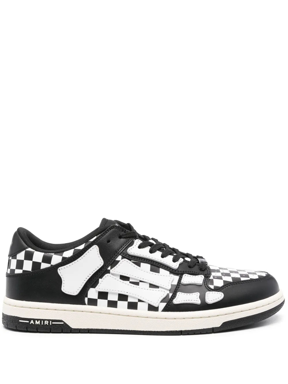 Black and white low-top sneakers with checkered side panels and lace-up front