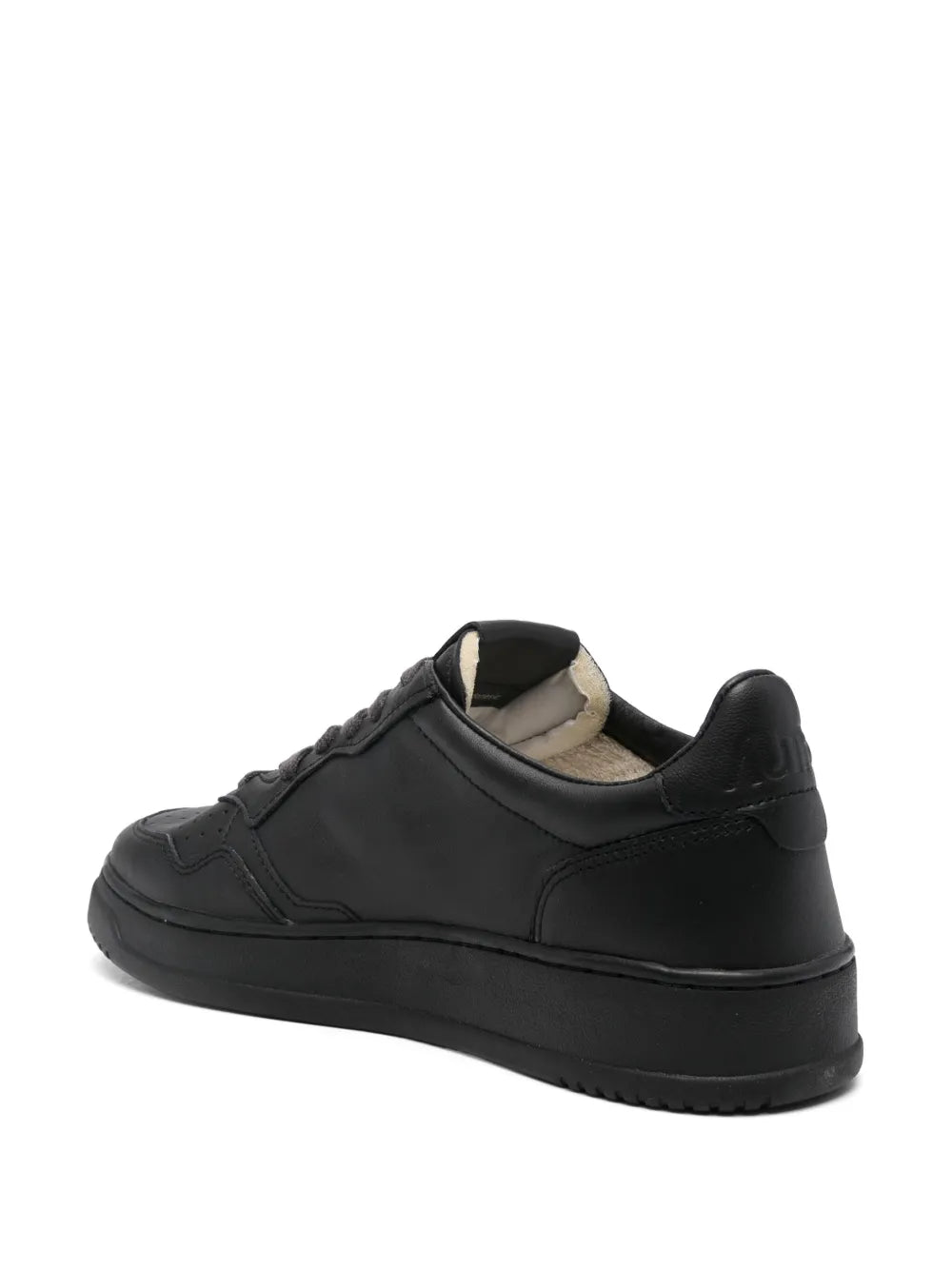 Autry black sneakers in monochrome, side and heel view with stitched panels.