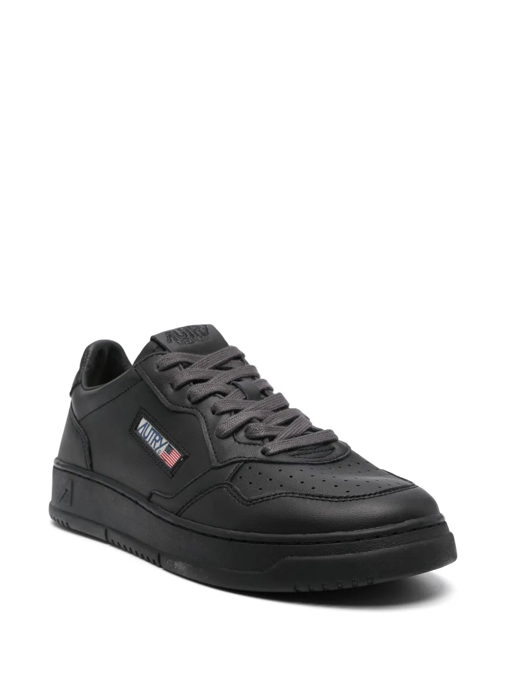 Autry monochromatic black low sneakers with lace-up and side logo detail.