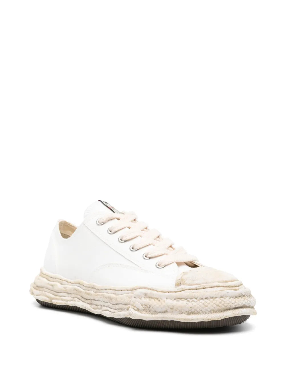 White lace-up sneakers with side panel stitching and textured layered outsole