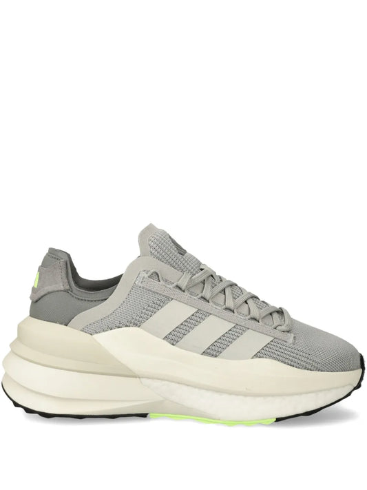 Grey knit adidas Avryn sneakers with three stripes and cushioned off-white sole