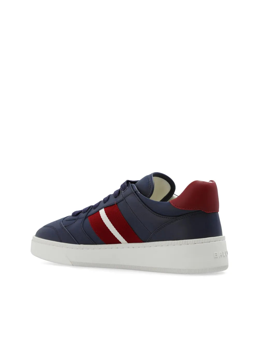 Navy low-top sneakers with red heel panel, stripe detail, and light rubber sole