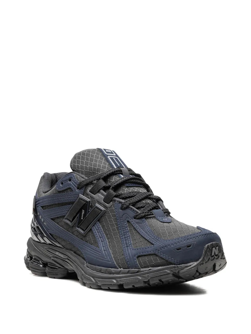 New Balance 1906R side-view running sneakers, padded collar and mesh-like upper