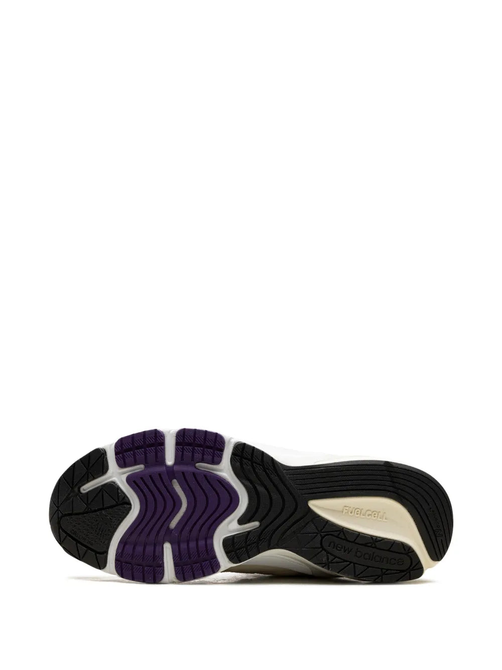 Sneaker outsole with black rubber tread and purple traction section