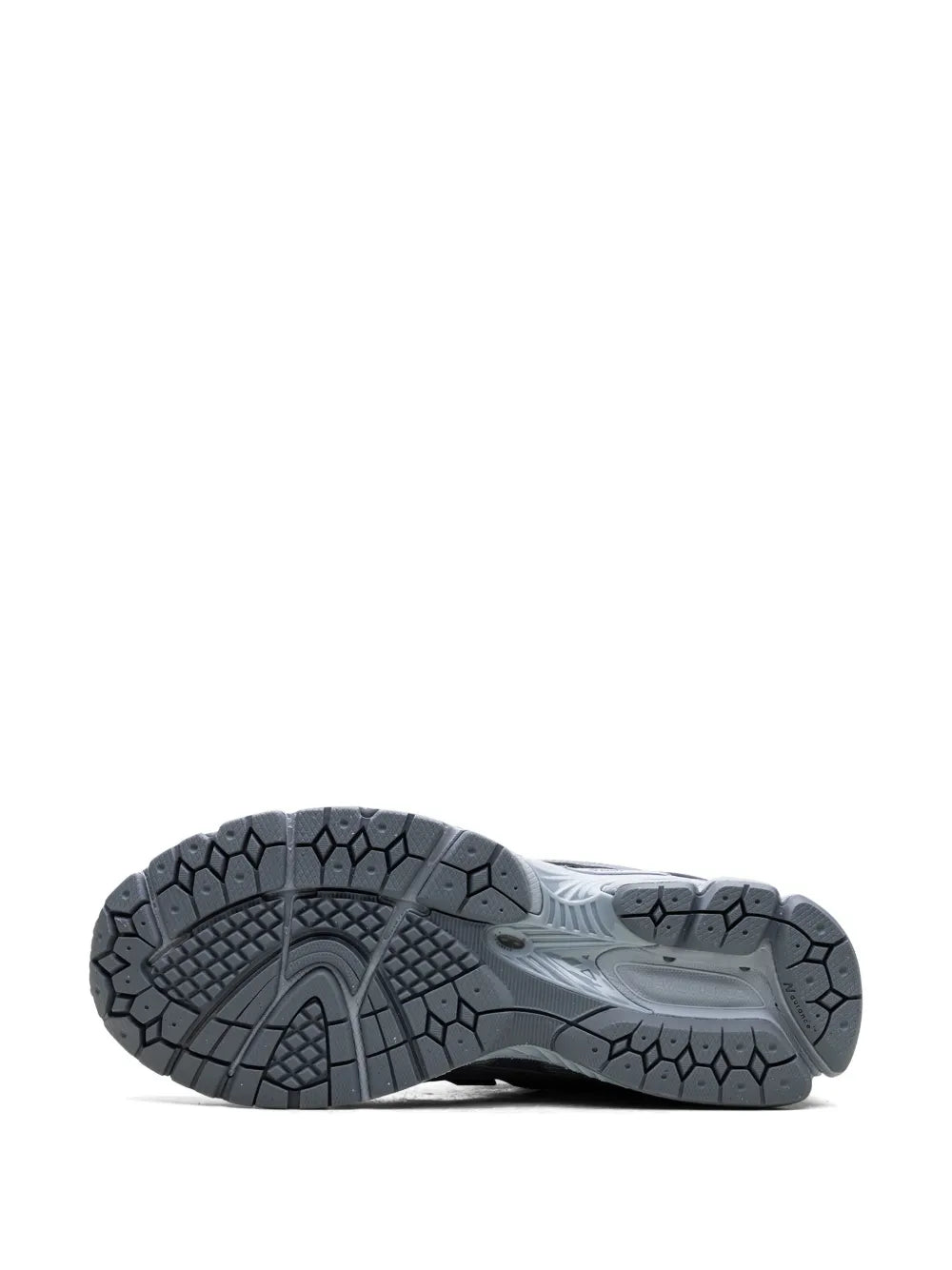 New Balance 1906 grey sneakers outsole view with textured tread