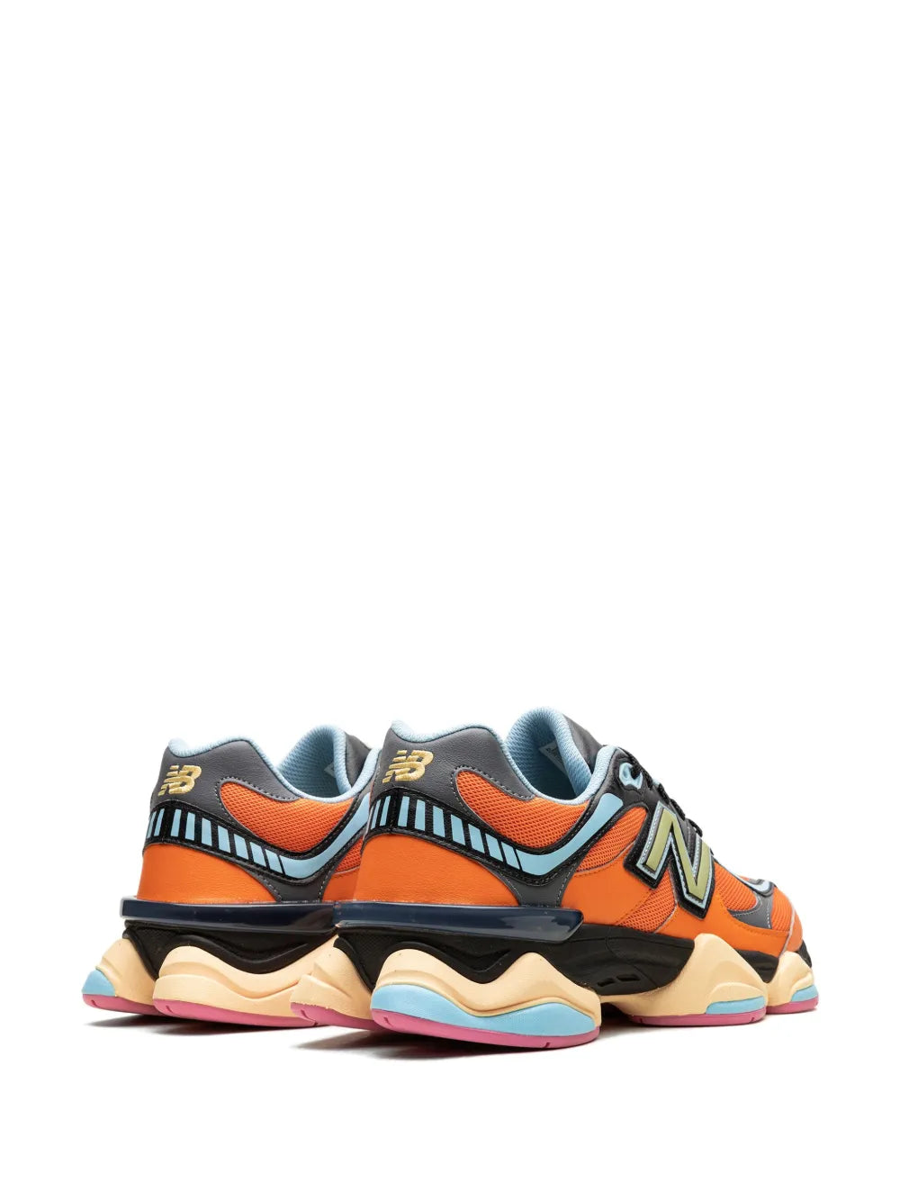 Orange/black 9060 sneakers with blue heel collar, striped side panels, and pink outsole trim