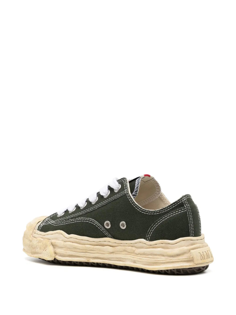 Dark green low-top sneakers with white laces, beige sole, rear pull tab
