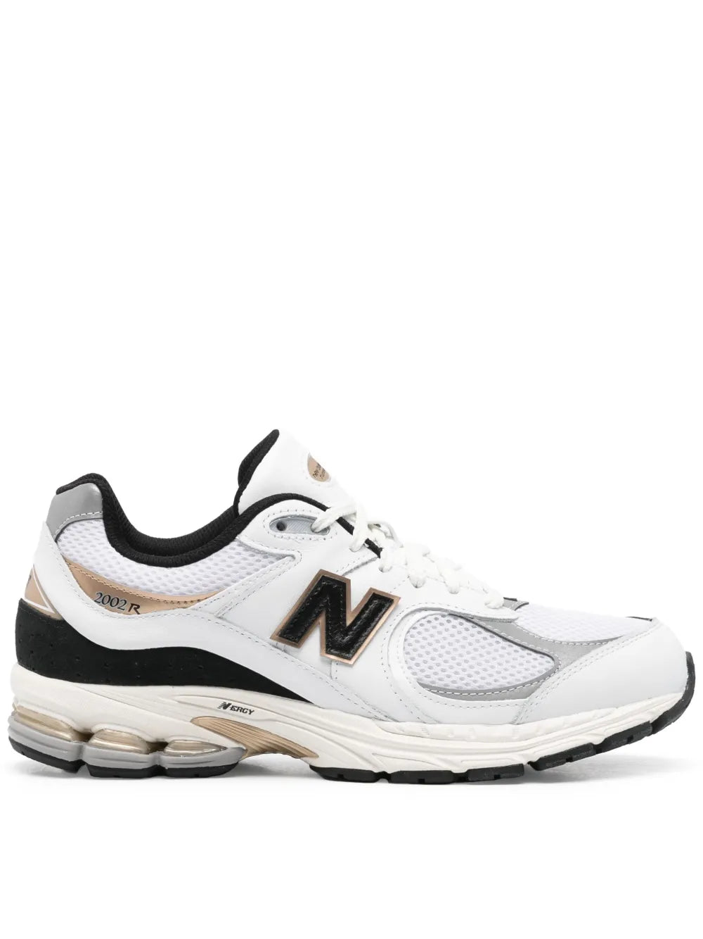 White and black New Balance 2002R style sneakers with mesh panels and lace-up design