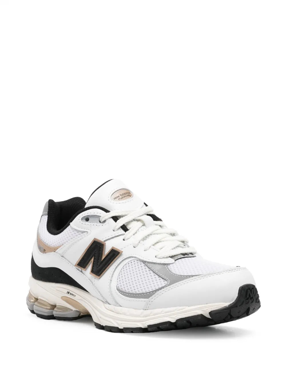 White and black low-top sneakers with N logo, breathable mesh, and padded collar