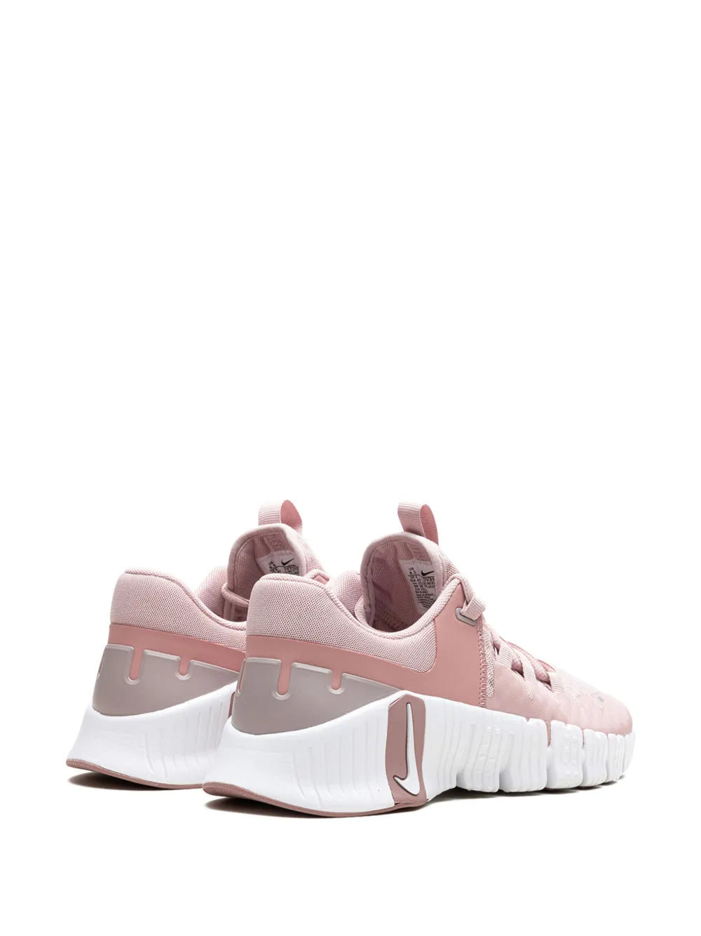Nike Free Metcon 5 pink sneakers with heel tab, lace-up front, and white midsole