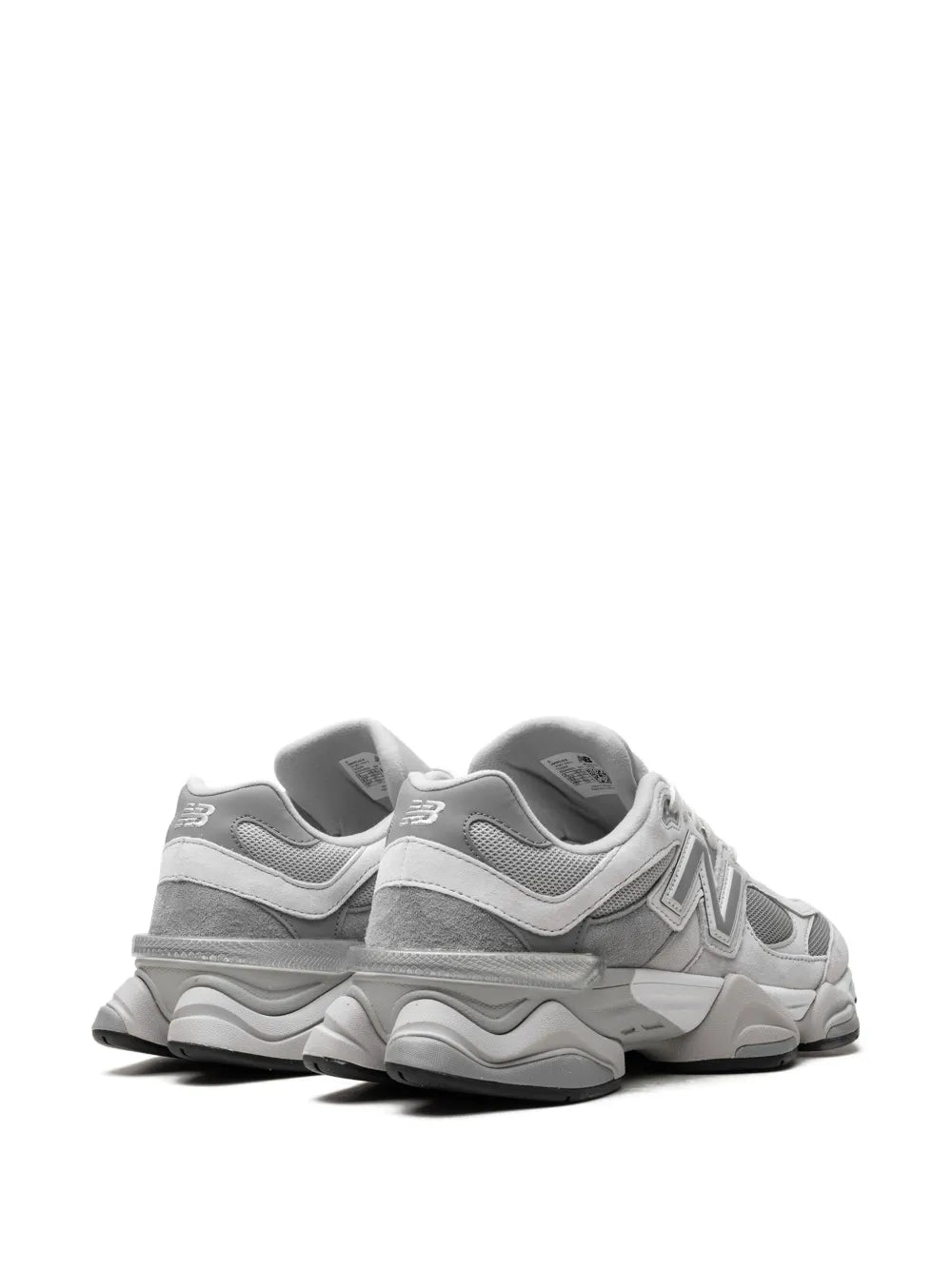 Grey New Balance 9060 sneakers, heel and side view with molded cushioning
