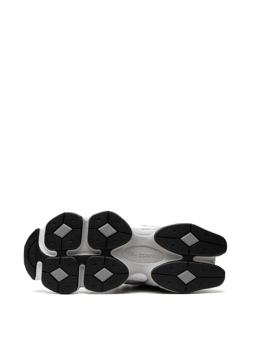 Grey New Balance 9060 outsole tread, black hex traction pattern