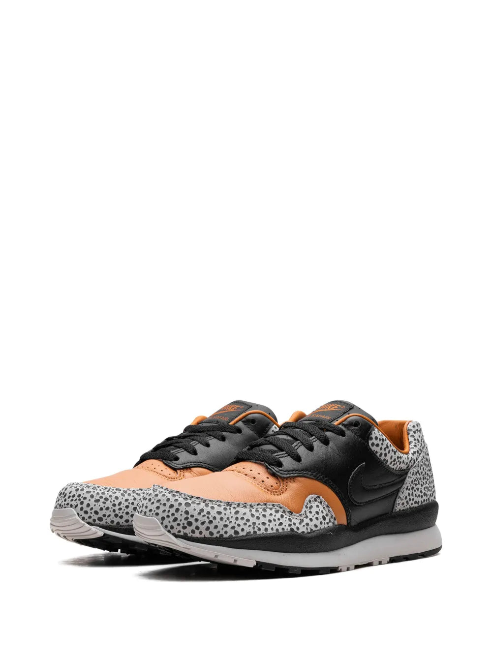 Nike Air Safari Electric sneakers, side view with orange heel, black laces, speckled toe