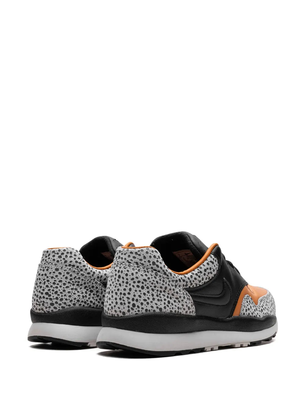 Nike Air Safari Electric sneakers, rear view with black lining, speckled overlays, orange pull tab