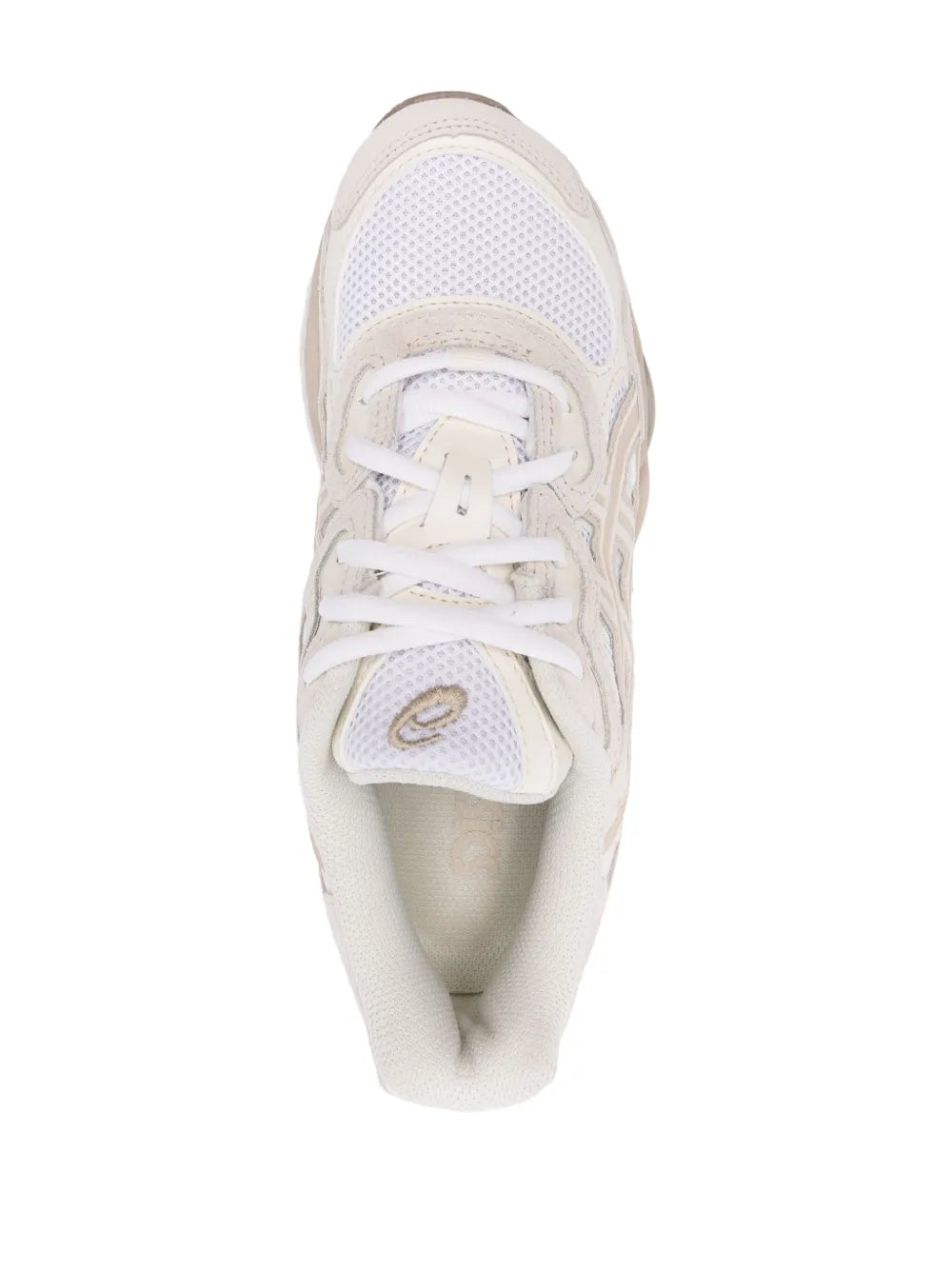Beige ASICS lace-up running sneakers, close-up of mesh upper and padded collar
