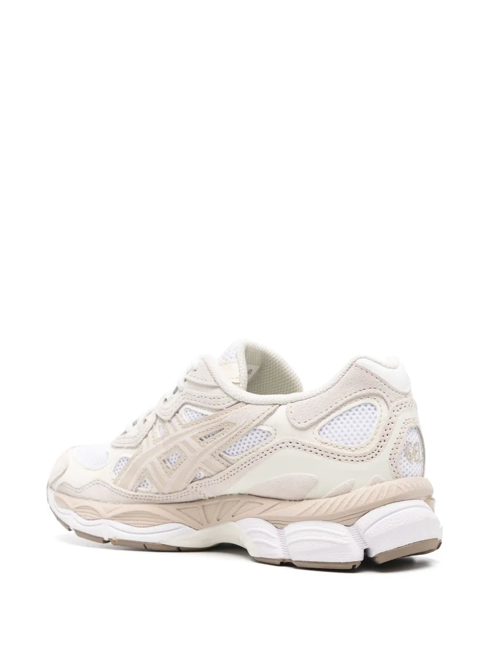 Beige ASICS lace-up running sneakers, rear 3/4 view with textured heel panel