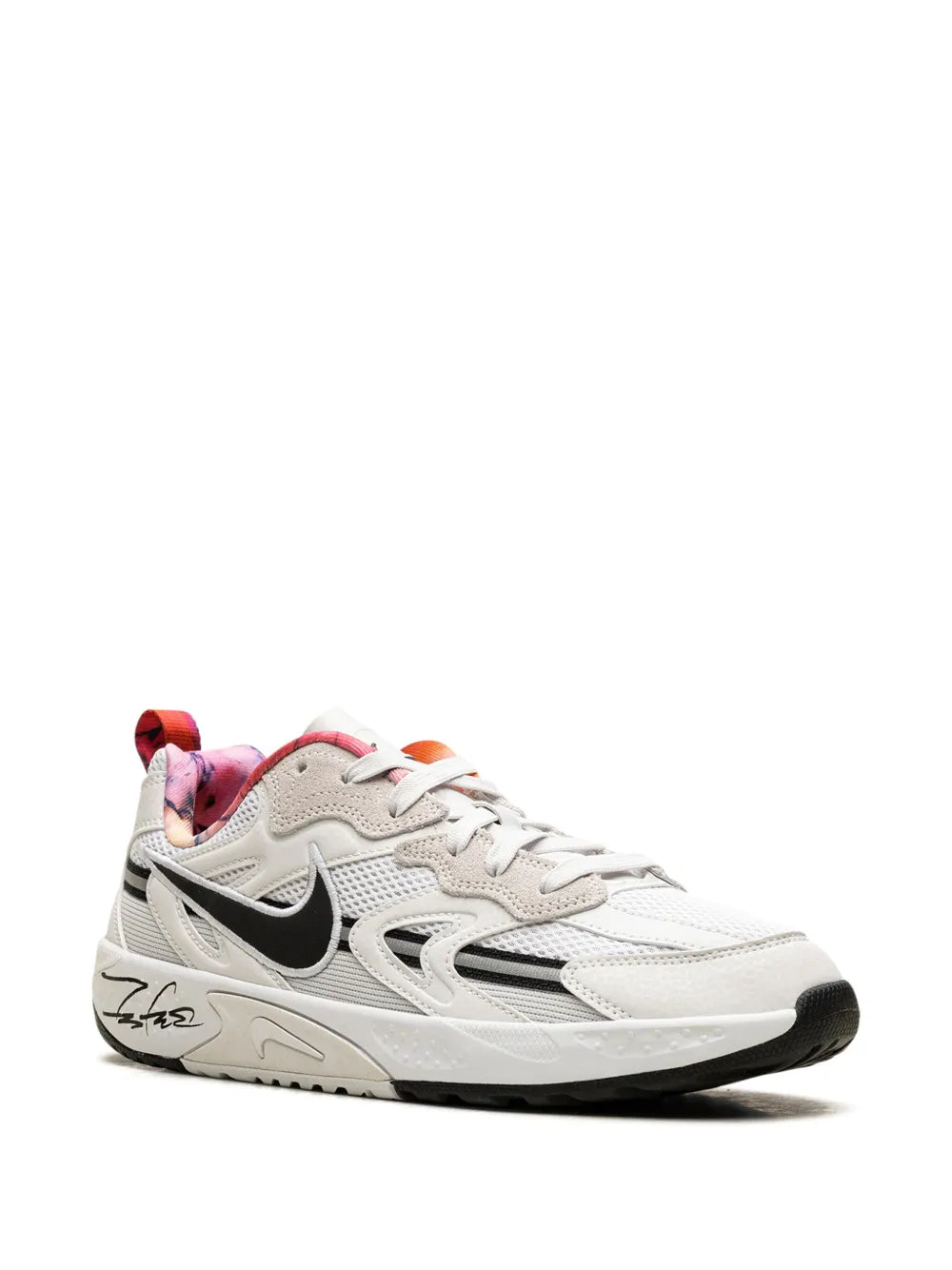 Nike white training sneaker with black swoosh, orange and red-pink lining