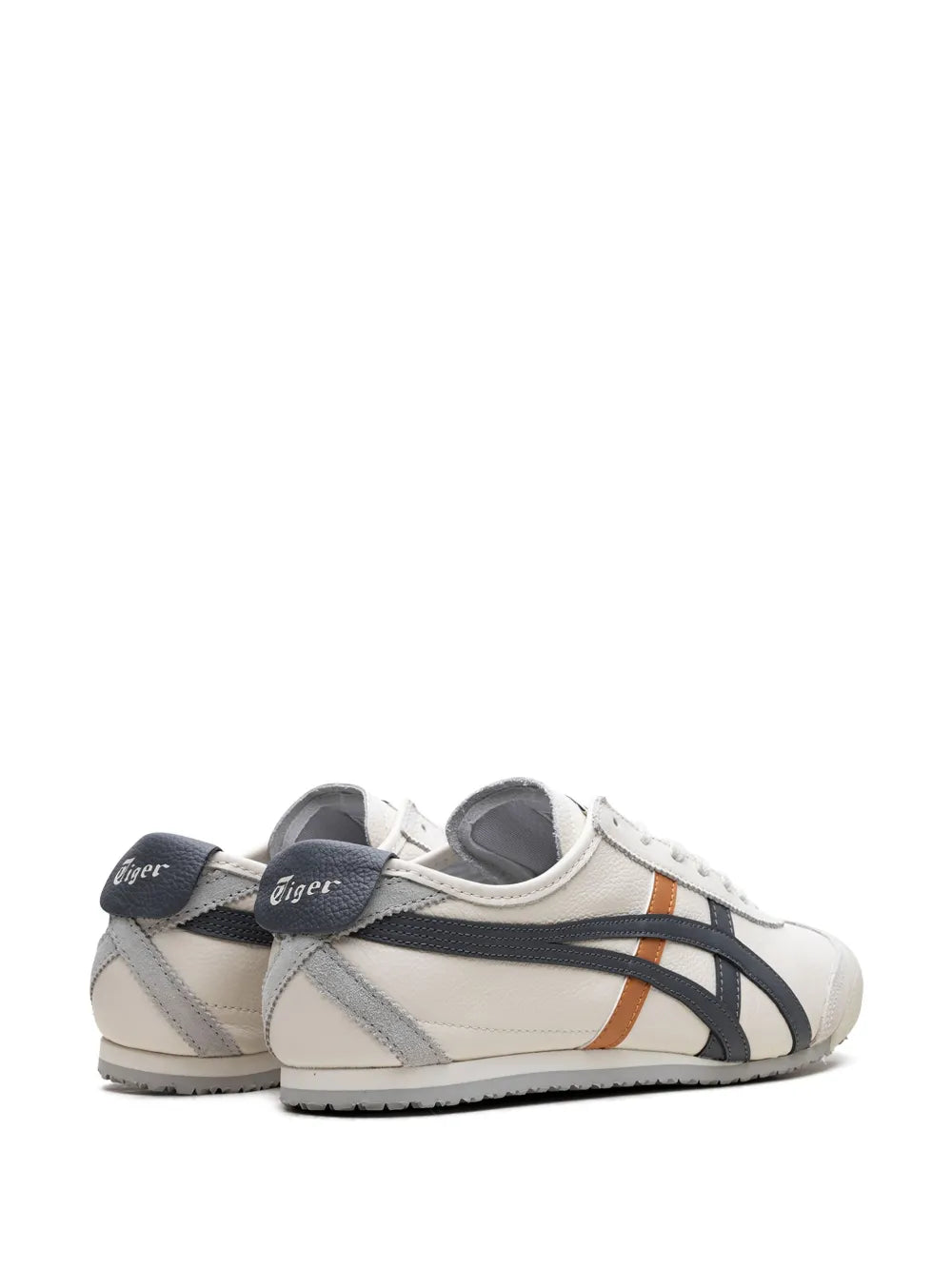 Mexico 66 sneakers, white with black stripes, orange accent, visible rear heel detail