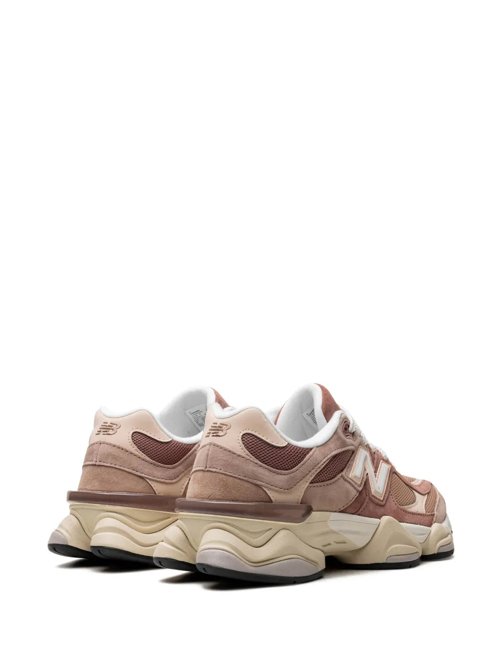 New Balance 9060 sneakers, side view with cushioned sole and lace-up upper in beige tones