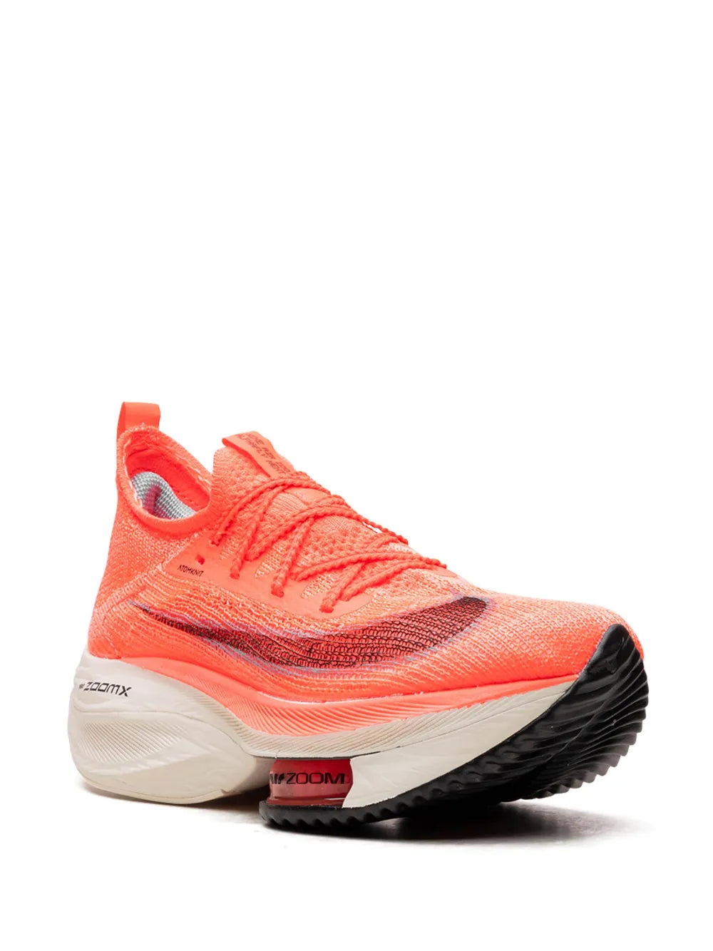 Nike running shoe in orange, side view with lace-up mesh and black textured heel