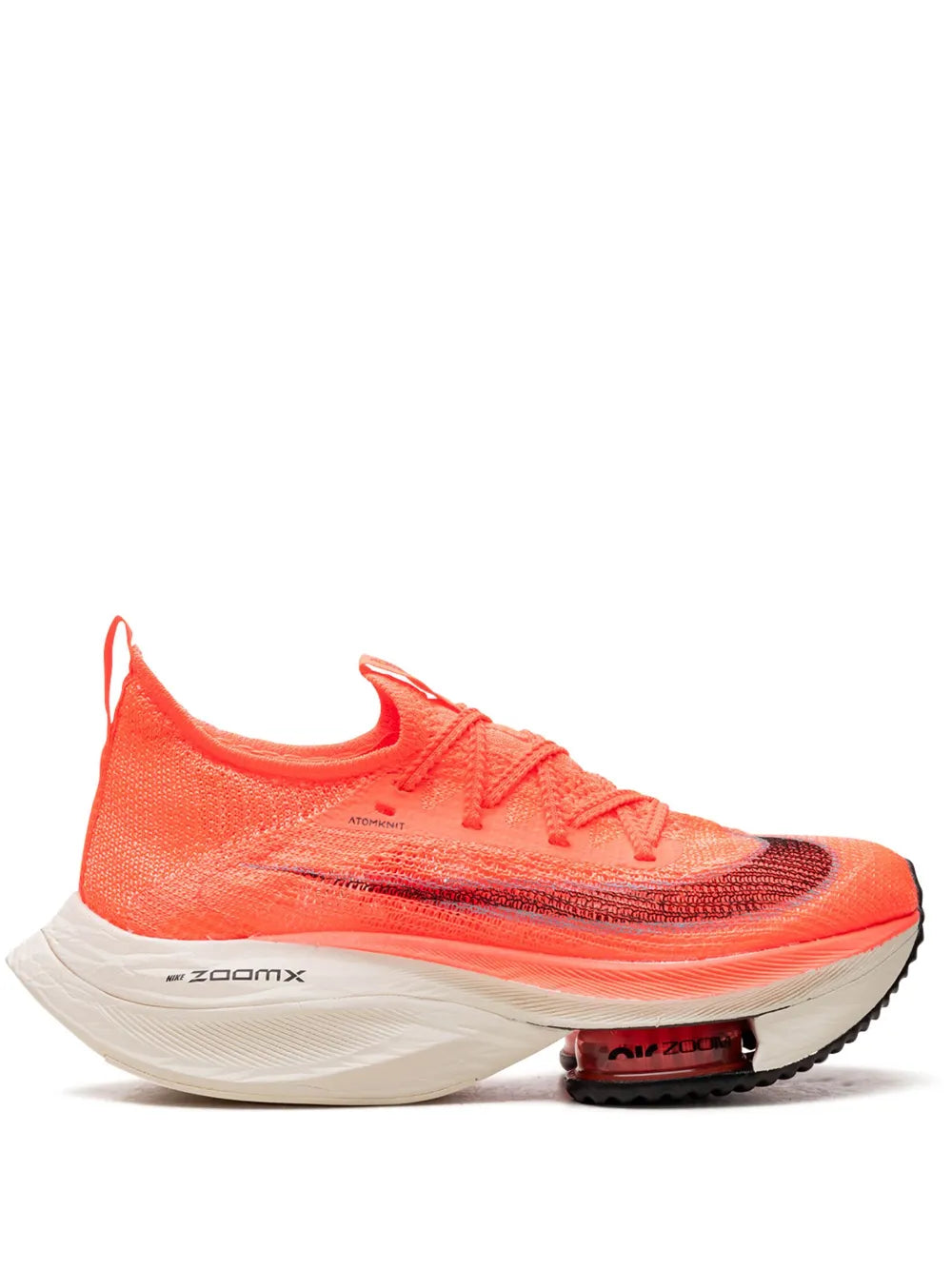 Nike running shoe in orange with ZoomX midsole and black outsole detail
