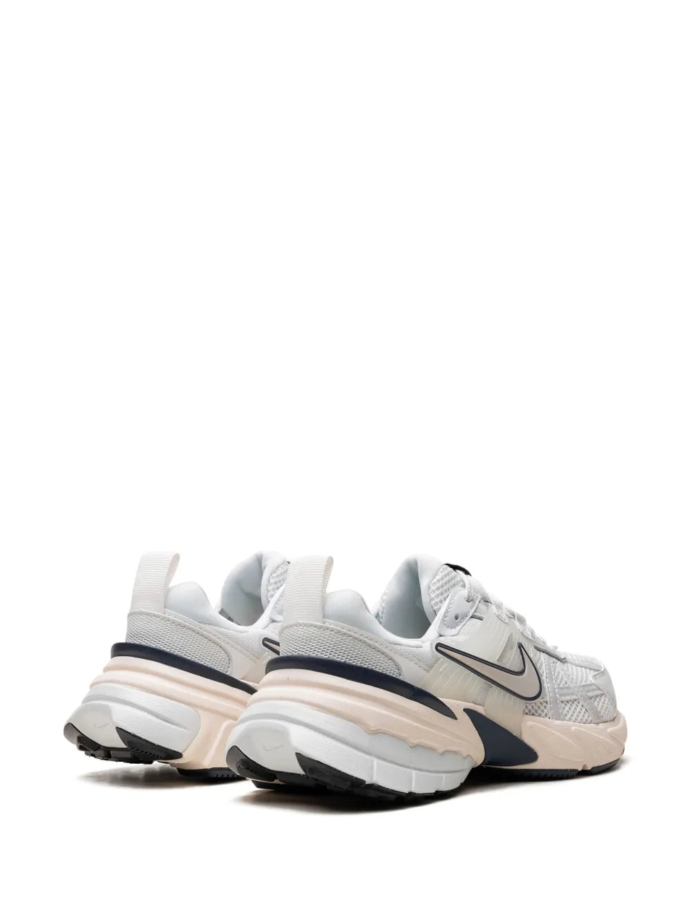Nike V2K Run sneaker back view, white upper with navy accents and thick sole