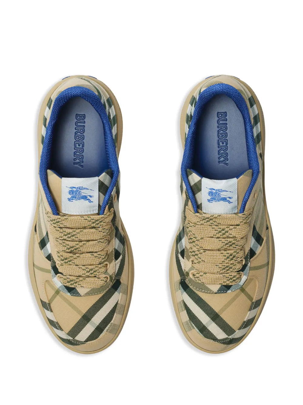 Pair of beige low-top sneakers with green/black check uppers and blue interior